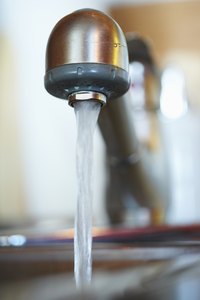Vibrations may be from the hot water expanding the pipes.