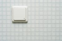 Tiles can be glued in place with Liquid Nails.
