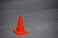 Use a traffic cone as a marker when learning how to parallel park.