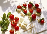 Create inexpensive starters with easy-to-find ingredients such as tomato, basil and mozzarella.