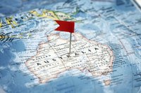 Close-up o map with pin stuck in Austrailia