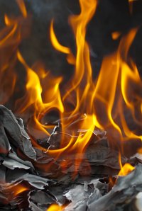 Paper flames recreate the bright yellow center and red edges of a real fire.