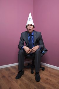 A dunce cap is simply a large paper cone.
