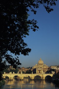 St. Peter's Basilica overlooks the Tiber River in Rome.