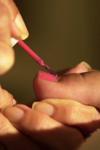 You can paint both your fingernails and toenails pink with a black stripe down the middle.