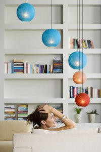 Hang pendant lights at varying heights for a dramatic effect.