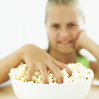 Add melted butter after -- rather than before -- cooking to minimize the chances of burnt popcorn.