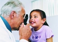 A young girl is at the doctor.