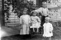 Pretty and practical checked dresses were an easy choice for little girls in the '20s.