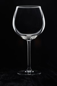 Fold a napkin in a wine glass for a decorative look.