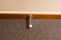 Often, it is not possible to distinguish between wall that were built before the carpet was installed and walls that were added after.