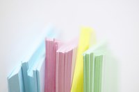 Decoupage uses glue to attach paper to a surface.
