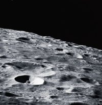 Pictures of the moon can be used to sculpt the details on a papier mache model.