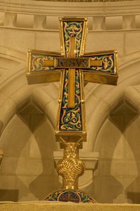 Braid a cross from a Palm Sunday palm frond.