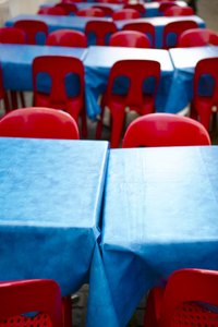 Create pompoms from plastic tablecloths.