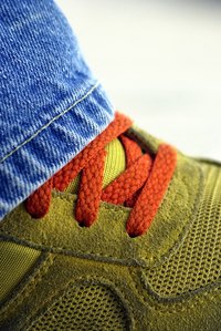 Lace your shoes loosely to slip them on and off.