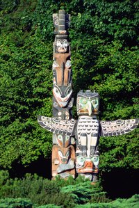 Totem poles can include birds with expanded wings.