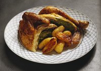 A slow cooker cooks a whole chicken to perfection.