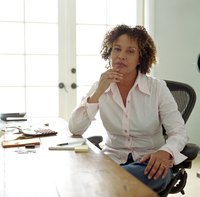 A woman works in her home-based office.