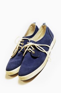 Clean stained Keds with a bit of elbow grease.