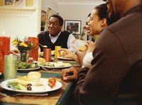 A family shares ideas during a Thanksgiving dinner.