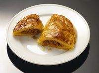 You can consider pastelitos miniature empanadas that use pastry dough instead of yeast dough.