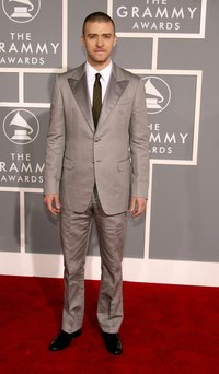 Singer Justin Timberlake paired an olive green tie with a shiny taupe suit.