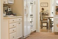 You can paint kitchen cabinets to match or contrast with kitchen appliances.