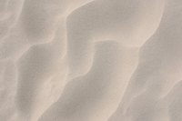 Sand is one of two types of aggregate used in concrete.