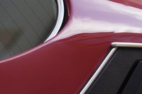 Talcum powder and other flatteners reduce paint sheen.