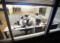 A look into a business office from outside.