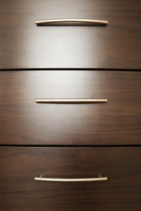 Install your pulls, knobs and other hardware in easy to reach locations.