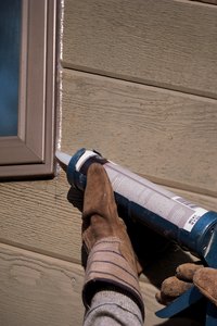 Reduce your electric bill by reducing indoor air leaks with trim caulking.