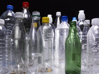 Use plastic bottles as a surprise gardening tool.