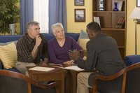 Mature couple meeting with a financial advisor