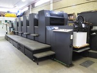 Lithograph printing machine in a factory.