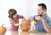 Allow an adult to do the carving; the kids can help with the messy work.