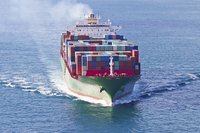 Cargo ship in water.