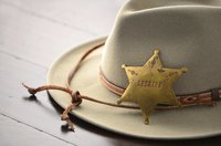 Use a reference photo to help create a more realistic police badge.