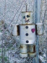 Use miscellaneous odds and ends such as buttons to embellish the robot.