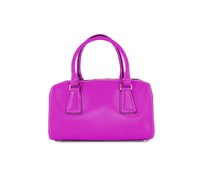 A pink handbag is a grownup accessory with the right outfits.