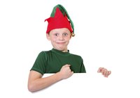 Even small children can make a paper elf hat.