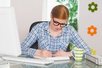 A writer is working from her home office.