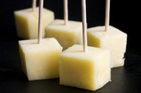 Use toothpicks to turn simple cheese hors d'oeuvres into mini-sculptures.