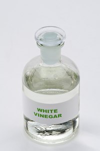 Vinegar can help remove stains from pots and pans.