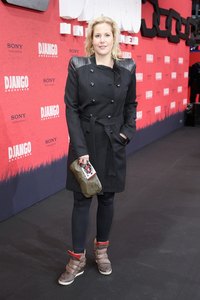 Annika Decker wears skinny jeans and high top sneakers at the "Django Unchained" Berlin Premiere in 2013.