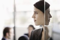 Institutional barriers may prevent a person from being promoted based on how she looks.
