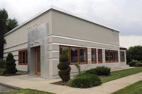 A new roof and structural improvements made to a small commercial building.