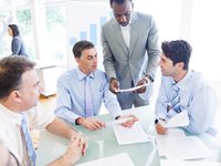 Co-workers going over business plan