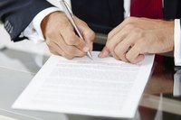 Young professional signing contract